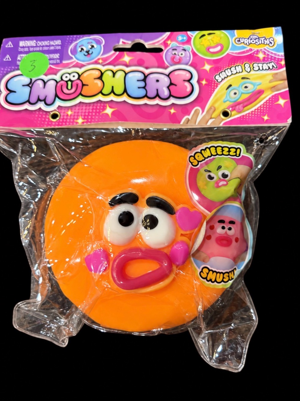 *BRAND NEW* Smushers Orange Squishy Face Toy with Pink Accents